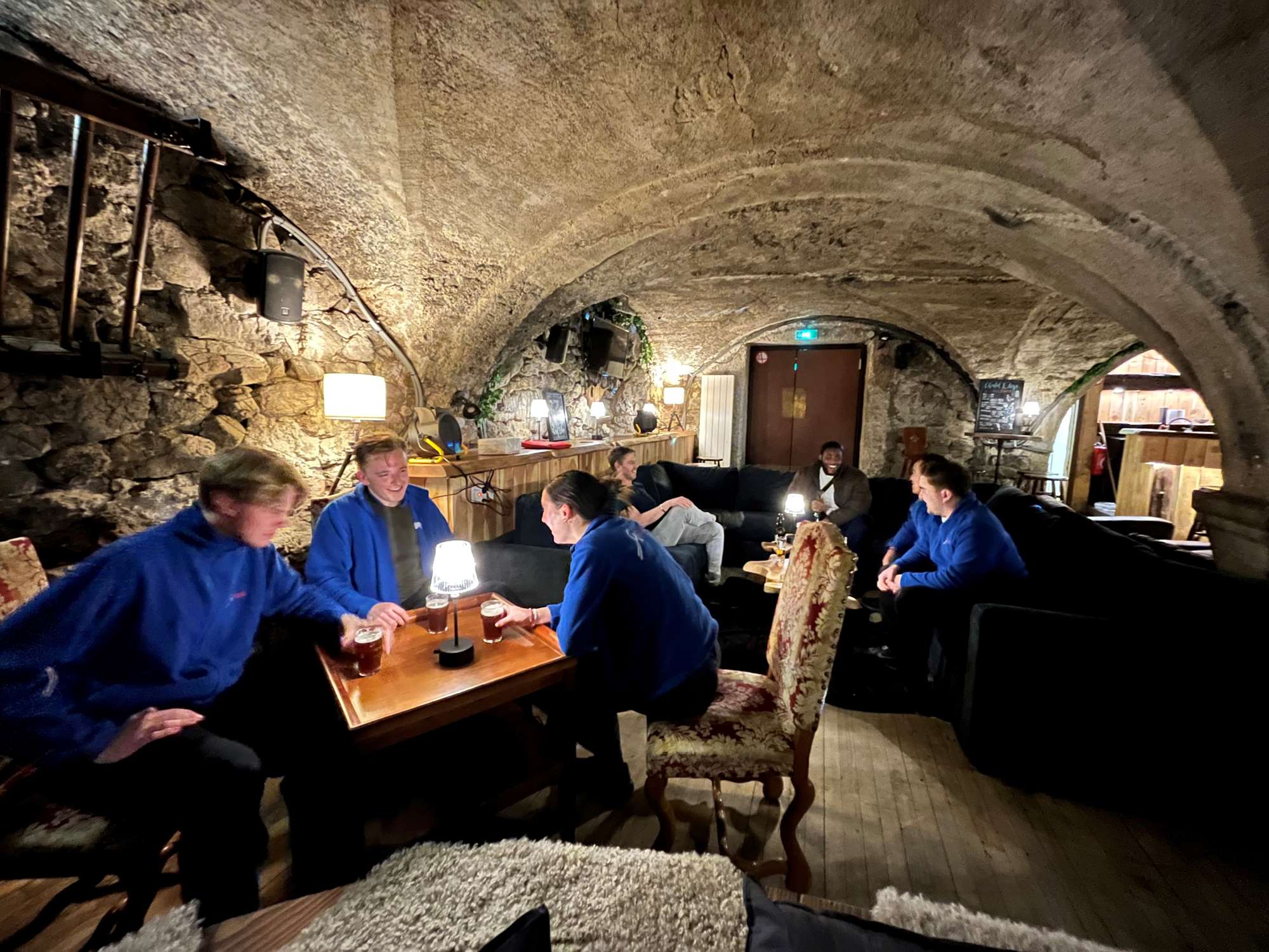 Ski Miquel team drinking on the sofa and table in the Elise bar