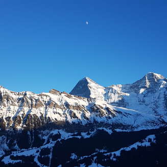 in Lauterbrunnen View of the Moon above the Eiger