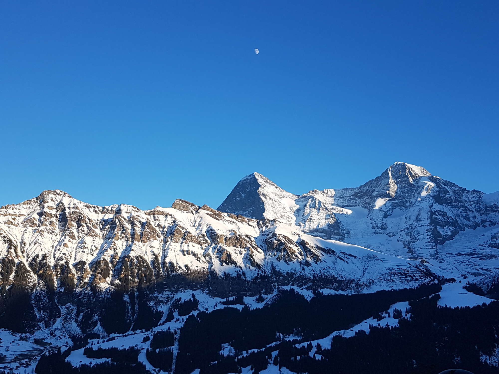 in Lauterbrunnen View of the Moon above the Eiger