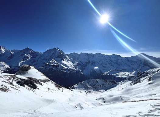 Snow-covered slopes and mountain panorama on the Schilthorn ski route above Lauterbrunnen