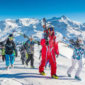 ESF Ski School walking along