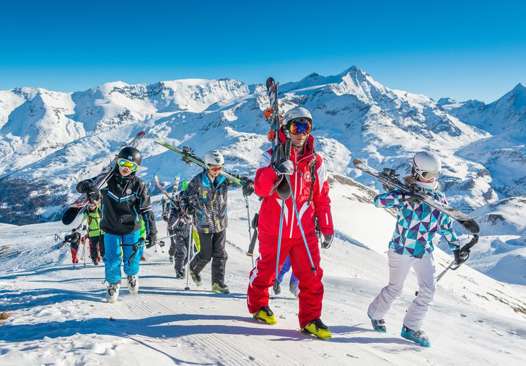 ESF Ski School walking along