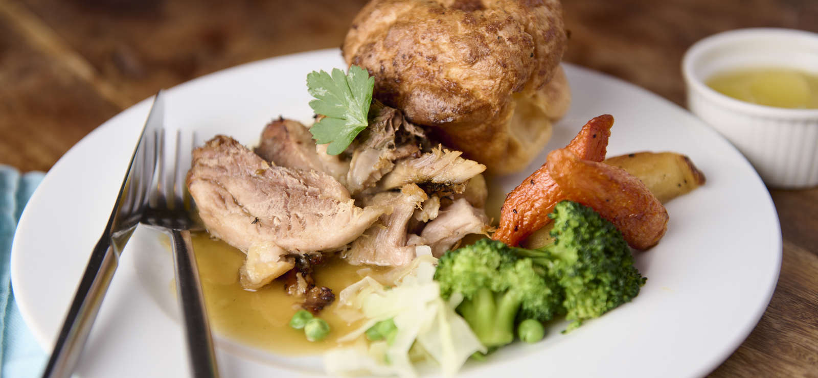 Roat pork with carckerling and Yorkshire pudding from the Ski Miquel menu