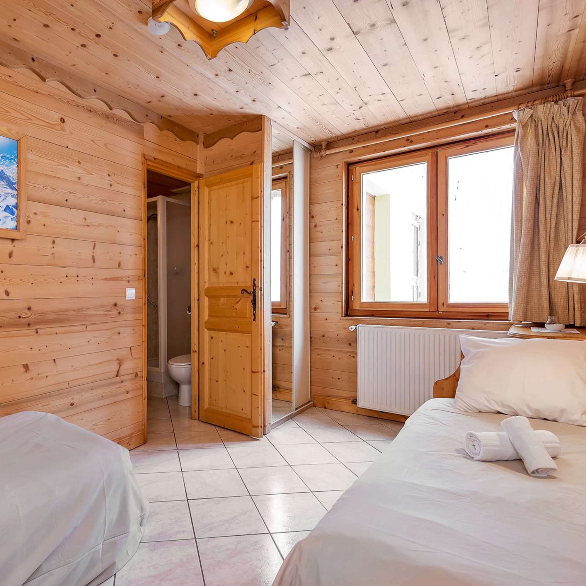 Twin room in the Chalet-Hotel Lucille 